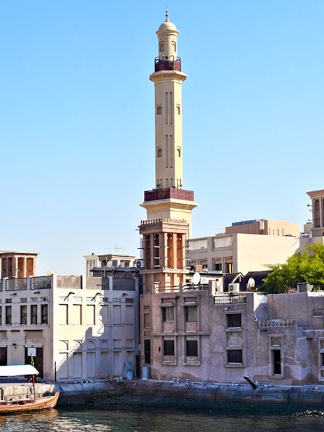 Historic Al Fahidi District with wind towers and minaret, Dubai.