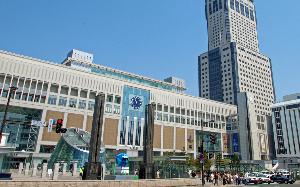 JR Tower in Sapporo with observation deck T38 visible against blue sky.
