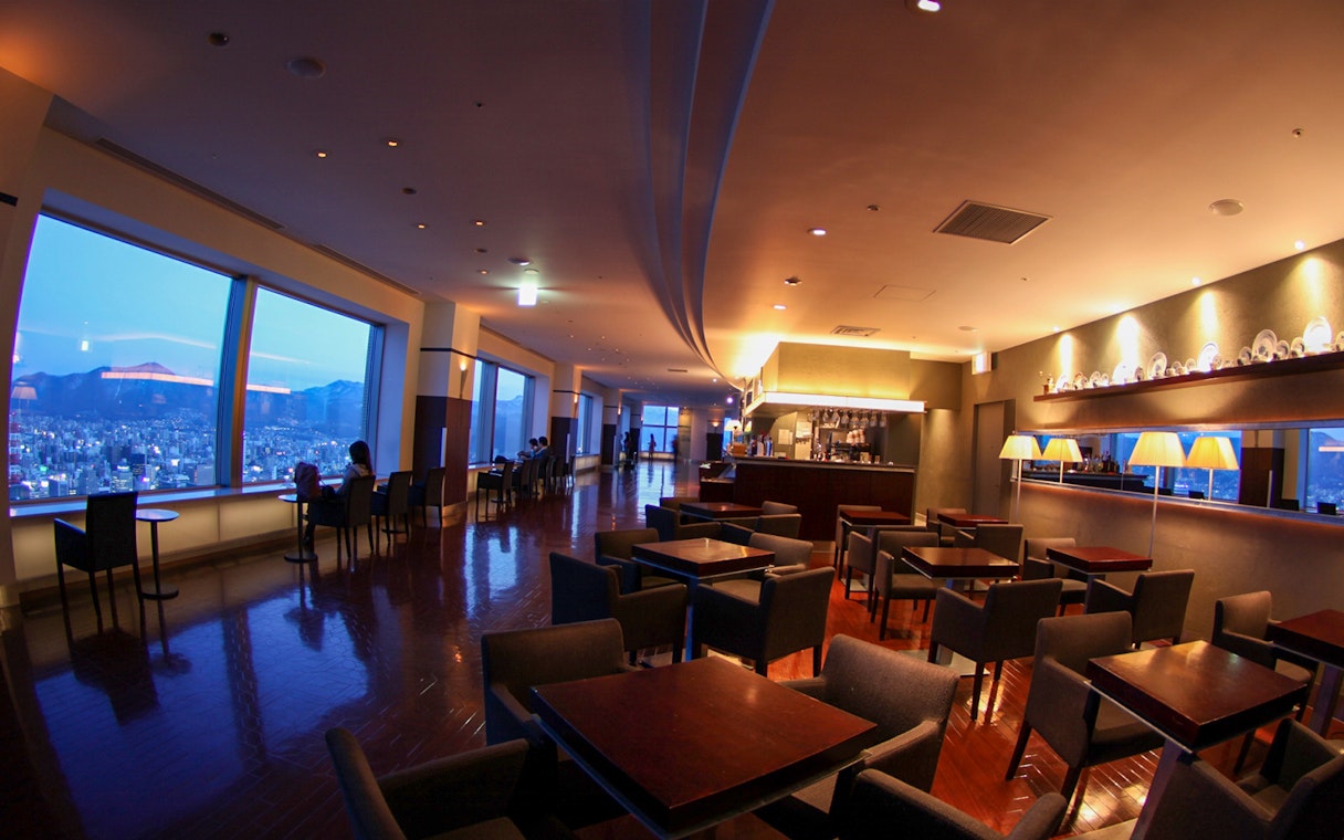 Observation deck interior at JR Tower T38 with city view, Sapporo, Japan.