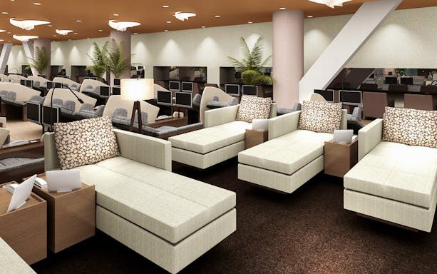 Spa LaQua relaxation lounge with reclining chairs and personal screens in Tokyo.