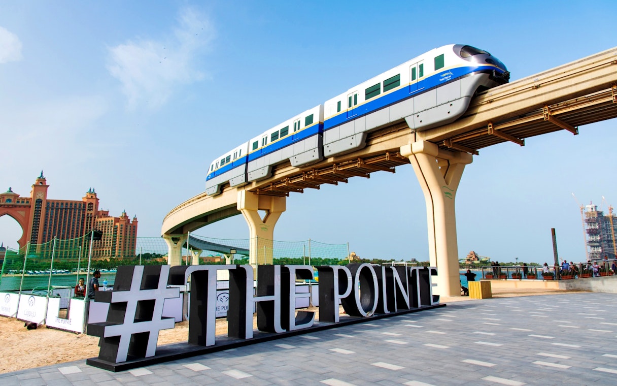 Monorail passing over The Pointe with Atlantis Hotel in Dubai.