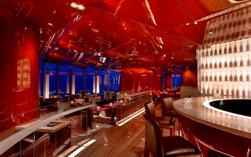 Luxurious Dubai restaurant interior with elegant dining setup for a private night tour experience.