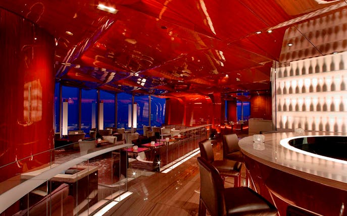 Luxurious Dubai restaurant interior with elegant dining setup for a private night tour experience.