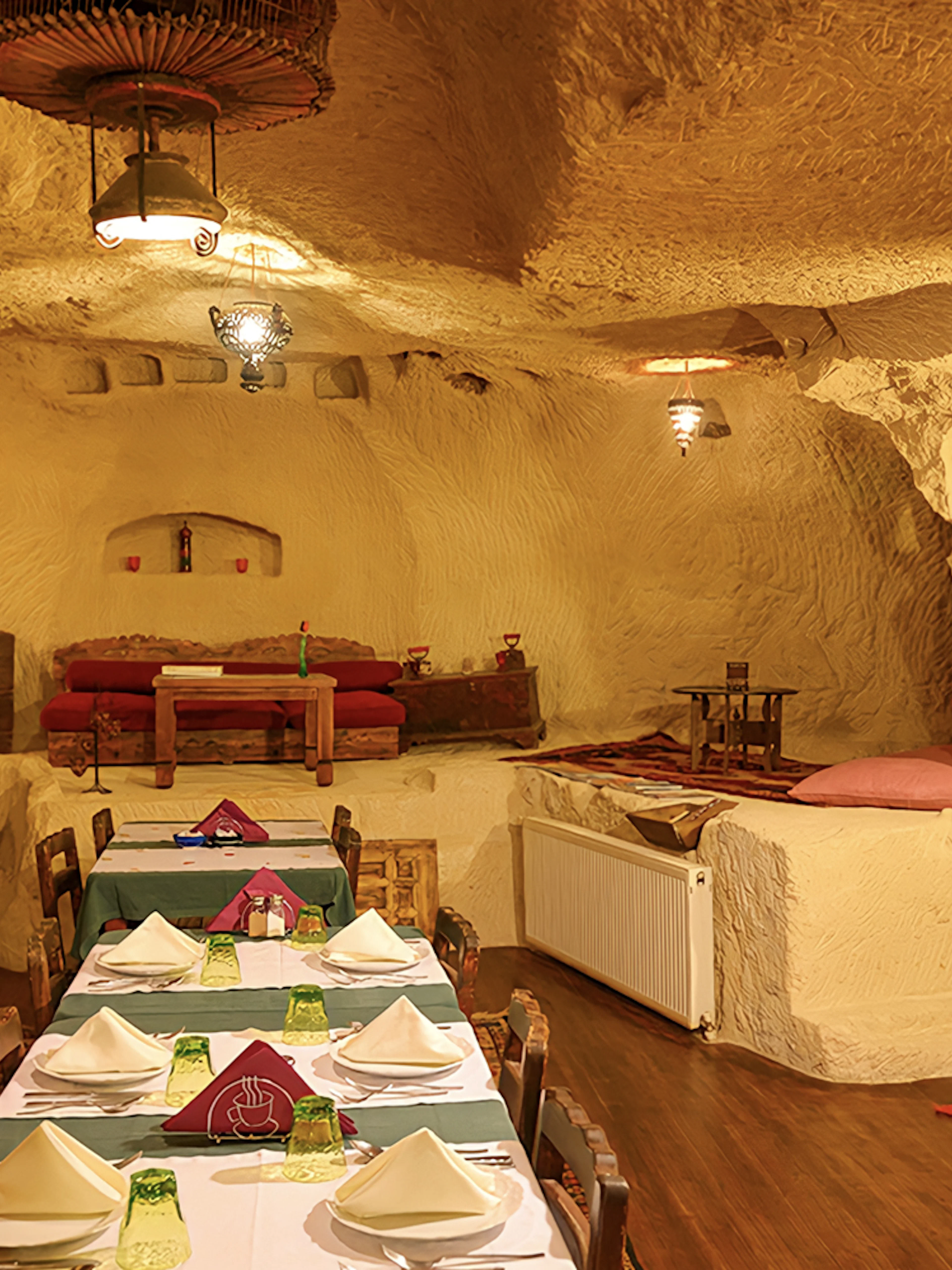 Cave restaurant interior in Cappadocia set for Turkish Night event.