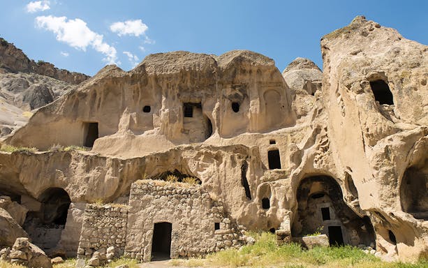Ancient rock-cut dwellings in Cappadocia, Turkey, featured on the Heart of Cappadocia Private Tour.