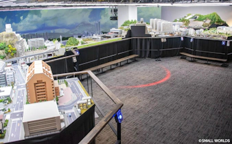 Miniature cityscape display at Small Worlds Tokyo exhibition.