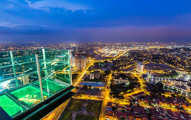 Sky deck view from The Shore Sky Tower in Melaka at night.