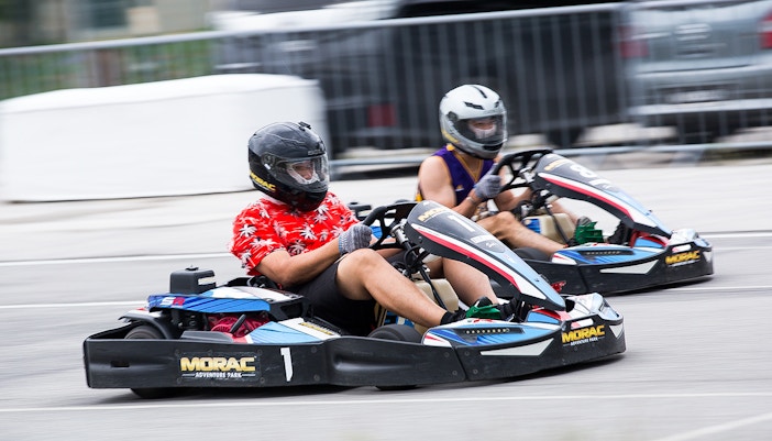 Racers driving go-karts on the track at Morac Adventure Park, Langkawi