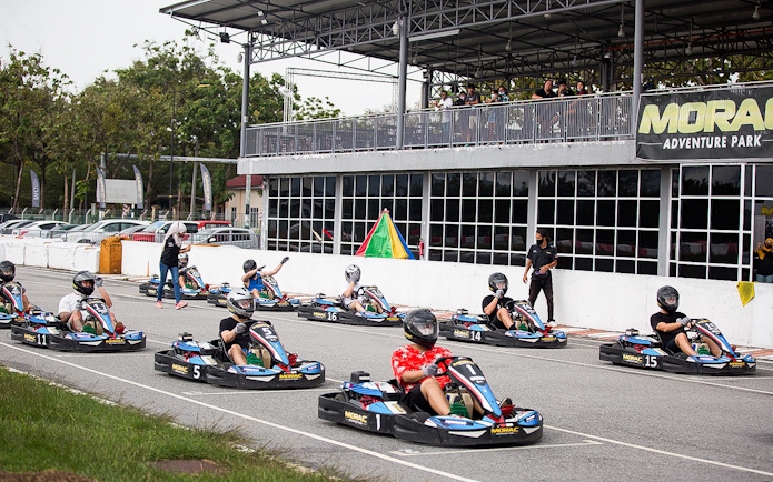 Go-kart racers at Morac Adventure Park, Langkawi, preparing for a race.