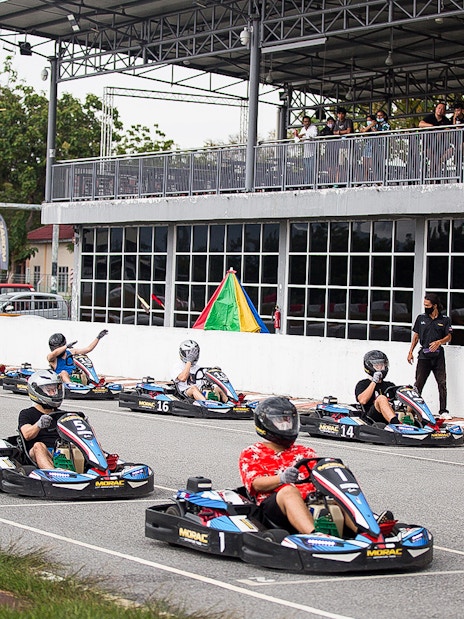 Go-kart racers at Morac Adventure Park, Langkawi, preparing for a race.