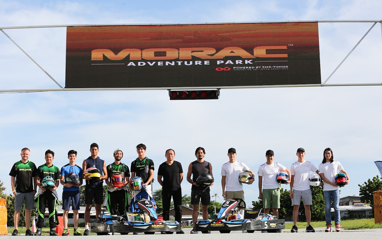 Participants holding helmets at Go-Kart Langkawi, Morac Adventure Park.