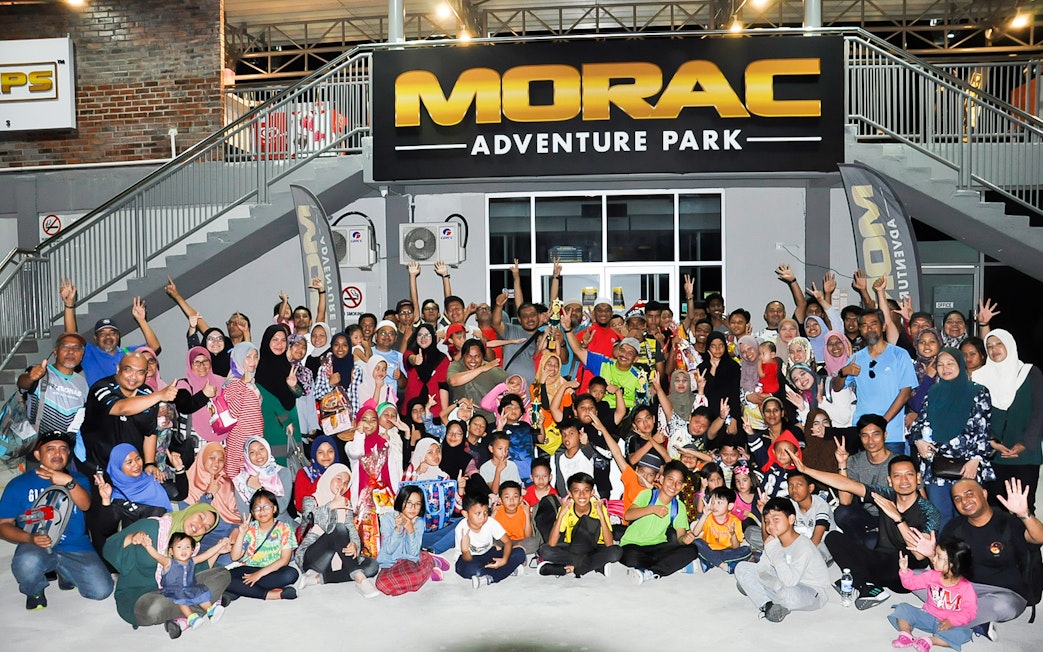 Group of people gathered at Morac Adventure Park, Langkawi, for a go-kart event.