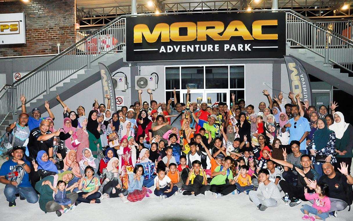 Group of people gathered at Morac Adventure Park, Langkawi, for a go-kart event.