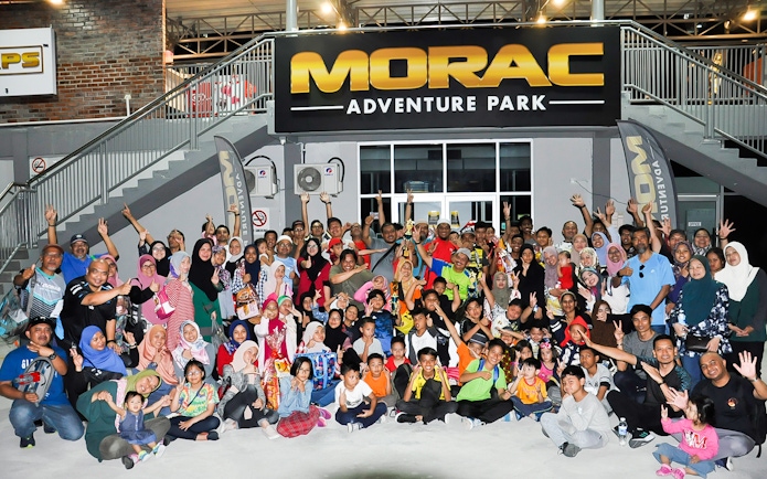 Group of people gathered at Morac Adventure Park, Langkawi, for a go-kart event.