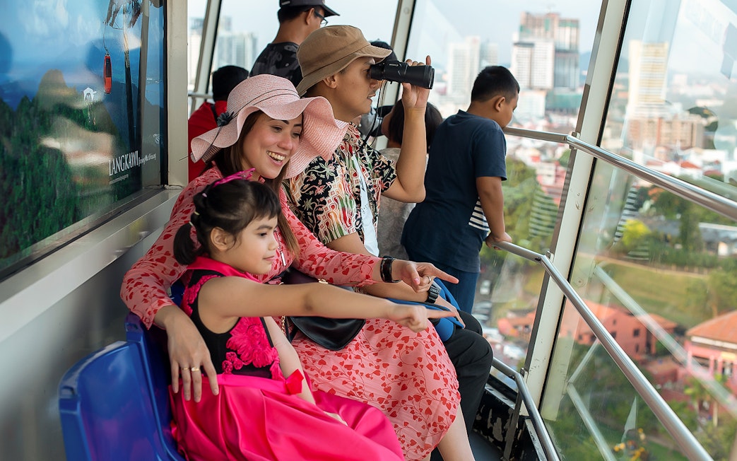 Family enjoying the view from Menara Taming Sari, Melaka.