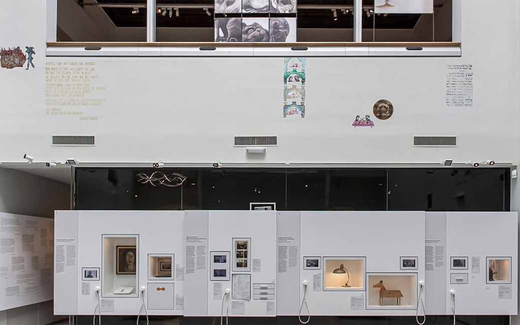 Exhibit display at Jewish Museum Vienna featuring historical artifacts and photographs.