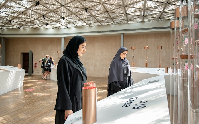 Visitors exploring exhibits at Al Shindagha Museum, Dubai.