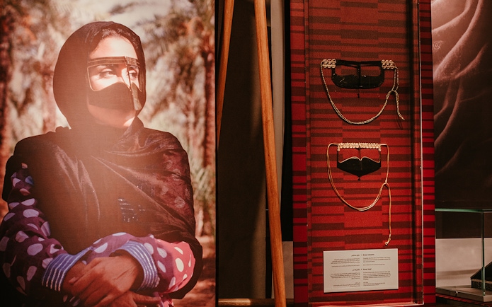 Traditional Emirati face coverings display at Al Shindagha Museum.