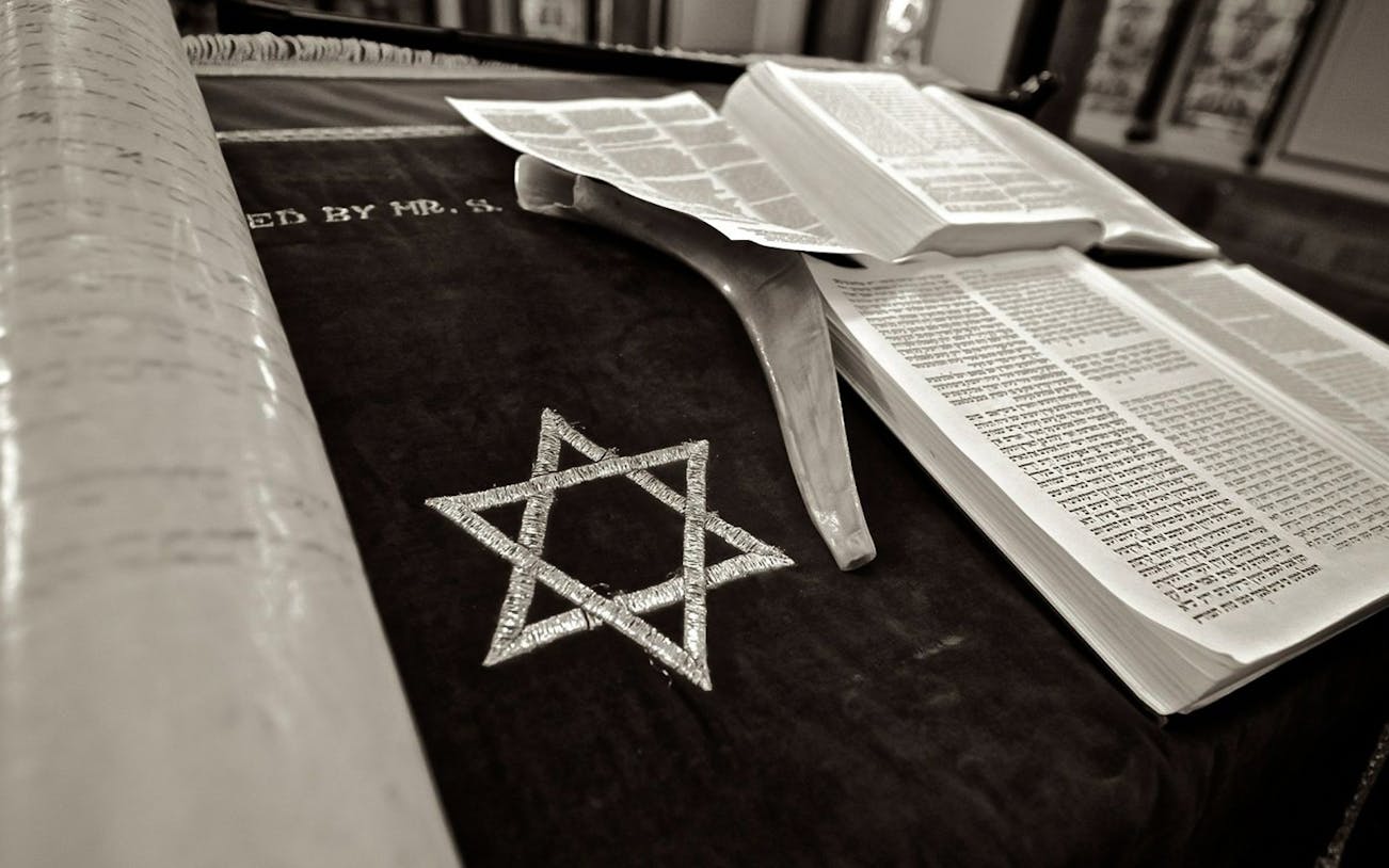Open Torah scroll and shofar on a table at Kazinczy Synagogue, Budapest.