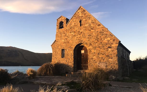Church of the Good Shepherd at Lake Tekapo during sunset, part of Mt Cook tour.