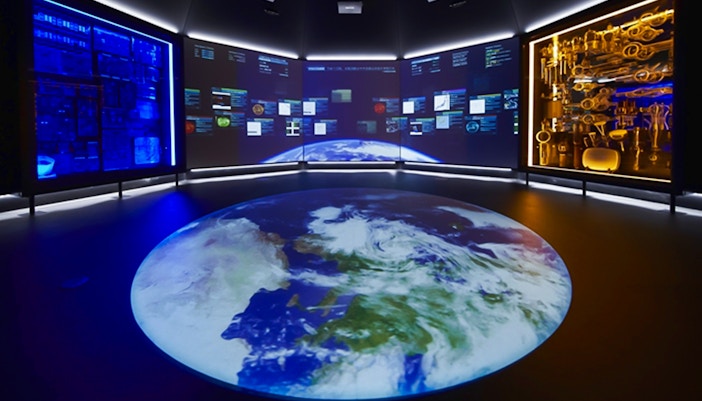 Interactive exhibit at National Museum of Nature and Science, Tokyo, featuring Earth projection and digital displays.