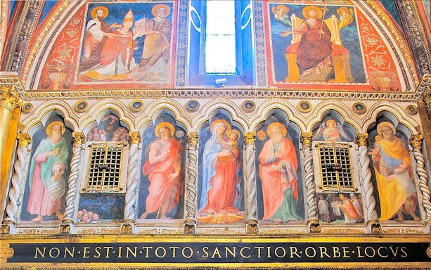 Frescoes in the Lateran Complex, Rome, depicting religious figures and Latin inscriptions.