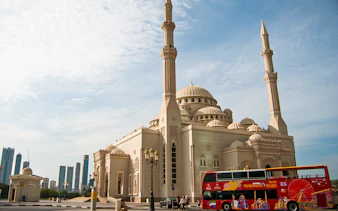 Hop On Hop Off bus in front of Al Noor Mosque, Sharjah.