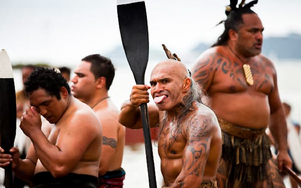 Traditional Māori warriors performing haka, Bay of Islands tour from Auckland.