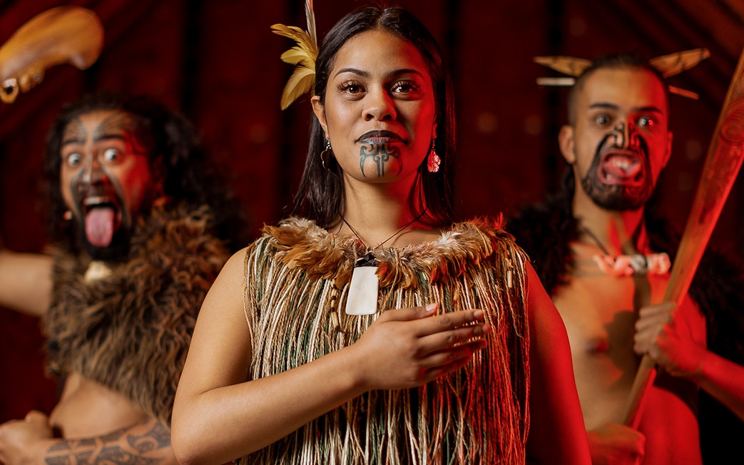 Maori performers in traditional attire at Auckland War Memorial Museum.