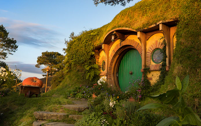Hobbiton Movie Set with round door and garden, part of Rotorua tour.