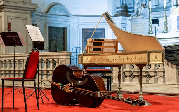 Harpsichord and cello setup for Four Seasons concert at Vivaldi Church.