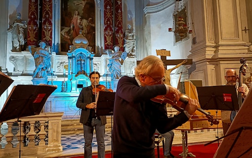 Musicians performing at Vivaldi Church during Four Seasons concert.