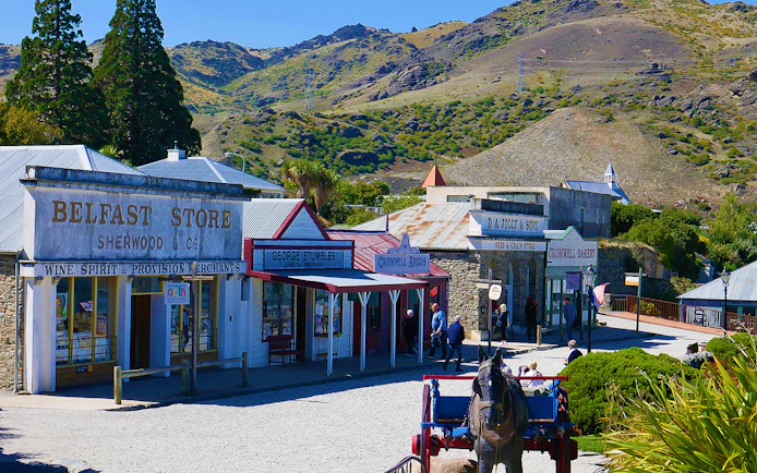 Historic street with shops in Cromwell, New Zealand, part of a gourmet food and wine tour from Queenstown.