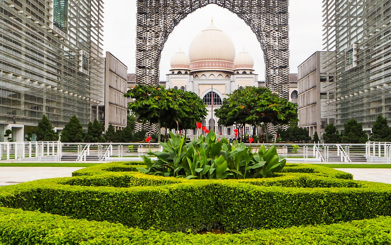 Modern architecture and gardens at a Kuala Lumpur landmark on the Great KL City Tour.