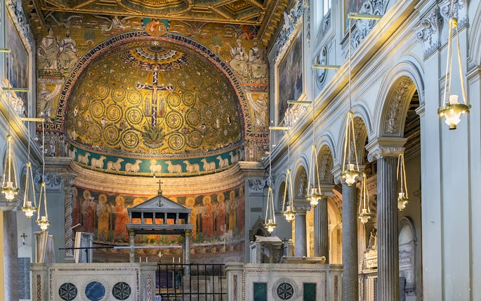 San Clemente Basilica's ornate apse mosaic in Rome, featuring religious iconography.