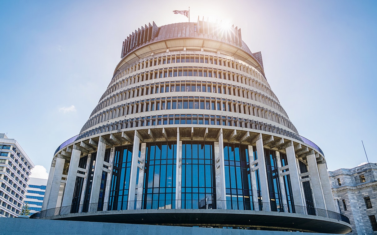 Wellington's Beehive building under a clear sky on a guided tour.