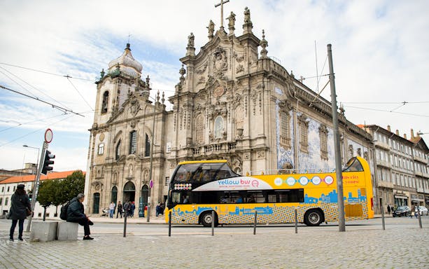 Vintage bus in front of Igreja do Carmo, Porto, part of 48 Hr Hop-On Hop-Off tour.