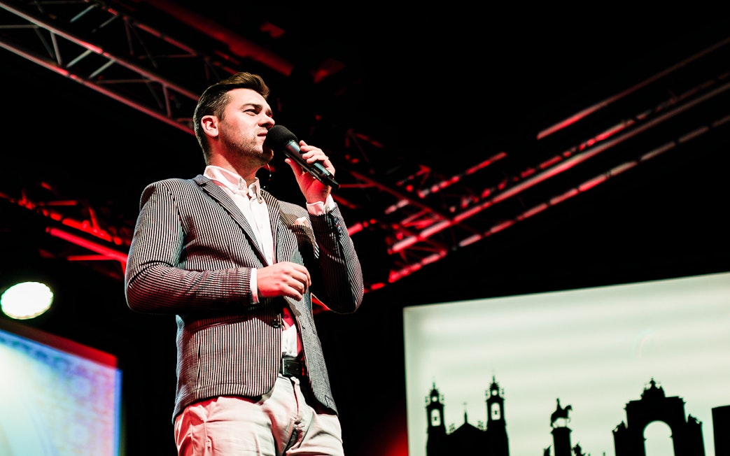 Performer singing Fado on stage in Chiado, Lisbon.