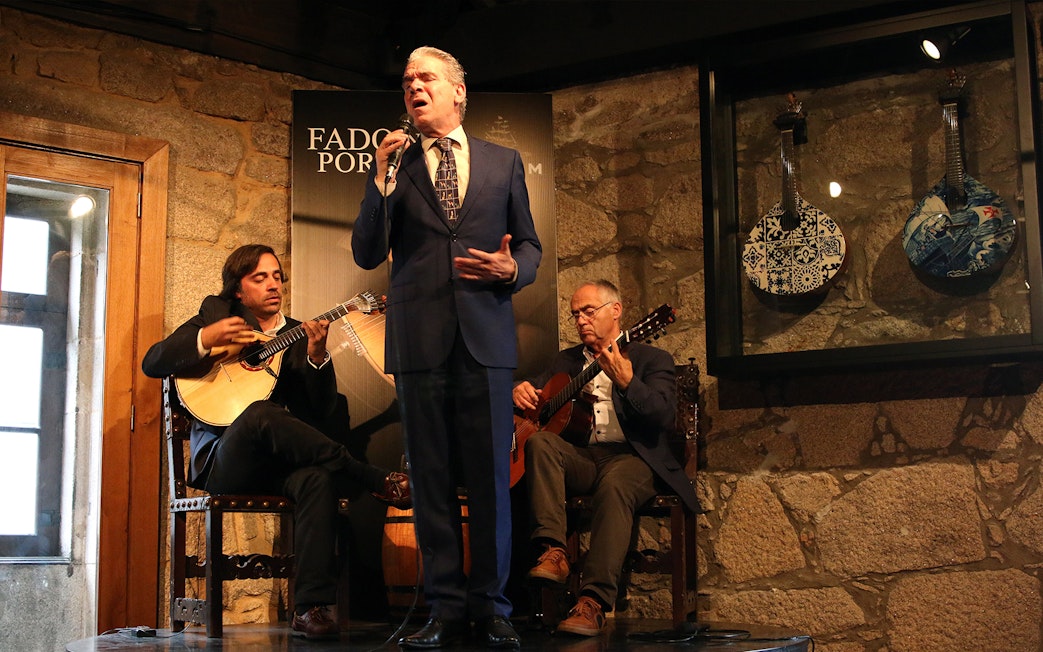 Fado musicians performing in a Port wine cellar, Portugal.