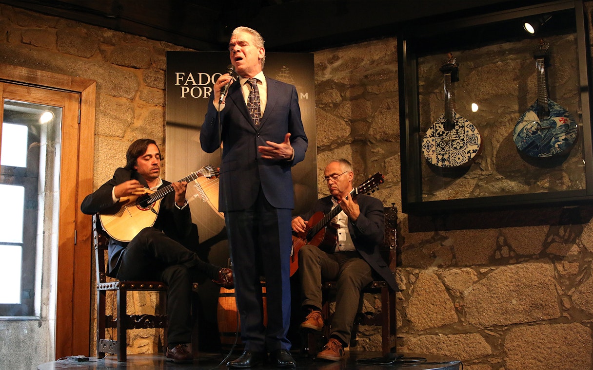 Fado musicians performing in a Port wine cellar, Portugal.