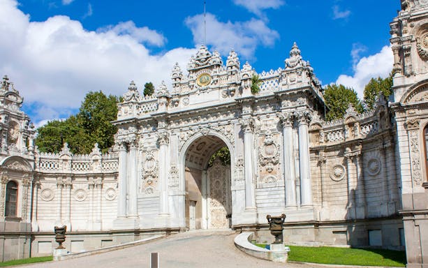 Dolmabahçe Palace gate in Istanbul on a sunny day.