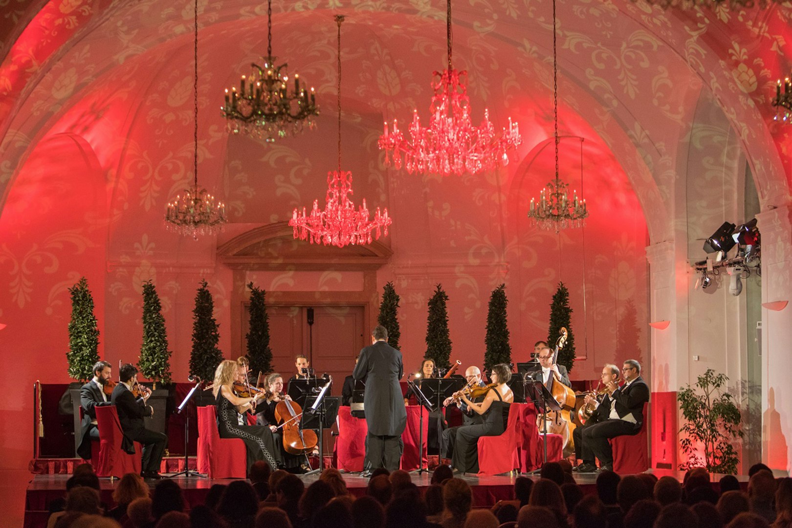 Orchestra performing at Schönbrunn Palace concert hall, Vienna.