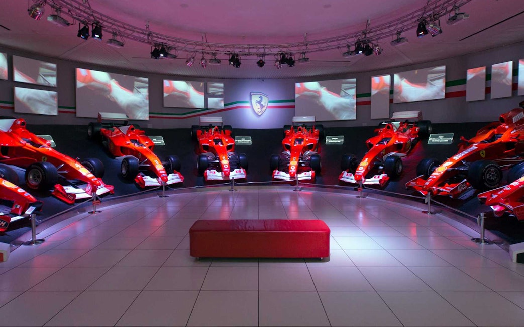 Ferrari race cars displayed at the Ferrari Museum Maranello during the Fiorano Track tour.