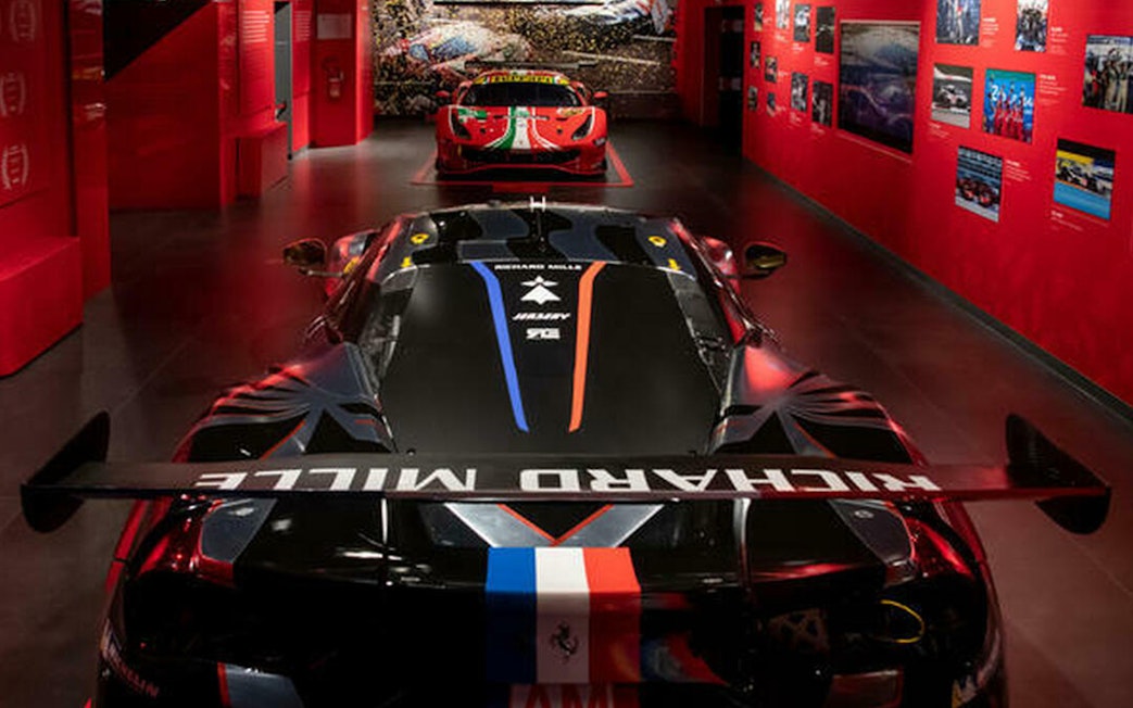 Ferrari race cars displayed at Ferrari Museum Maranello during Fiorano Track tour.