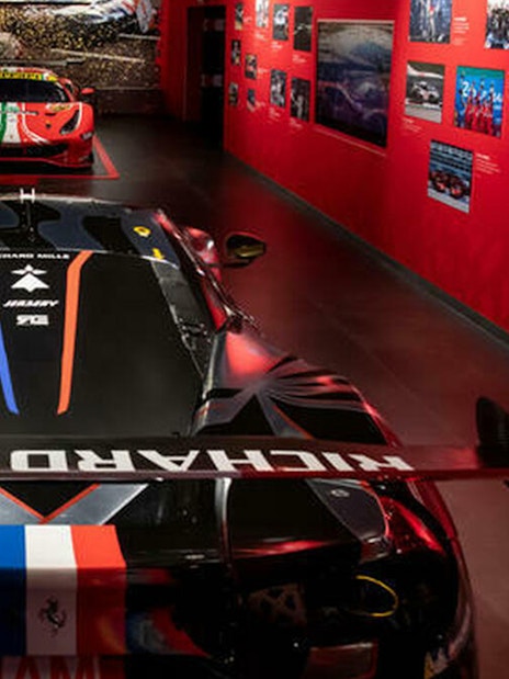 Ferrari race cars displayed at Ferrari Museum Maranello during Fiorano Track tour.