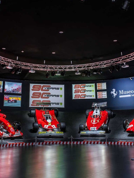Ferrari race cars displayed at Museo Ferrari Maranello during the Panoramic Shuttle Tour of Fiorano Track.