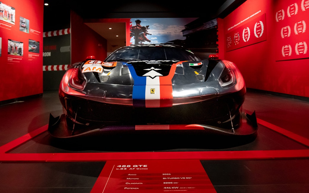 Ferrari 488 GTE displayed at Ferrari Museum Maranello during Fiorano Track tour.