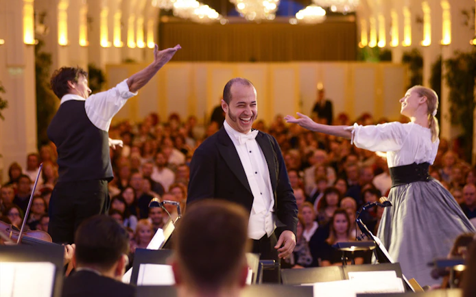 Conductor and performers at Mozart & Strauss concert in Schönbrunn Palace, Vienna.