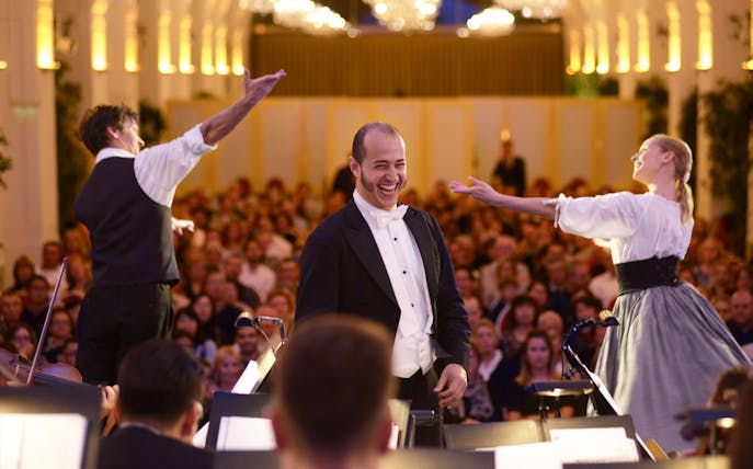 Conductor and performers at Mozart & Strauss concert in Schönbrunn Palace, Vienna.