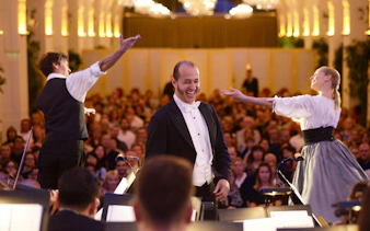 Conductor and performers at a Mozart and Strauss concert in Schönbrunn Palace, Vienna.
